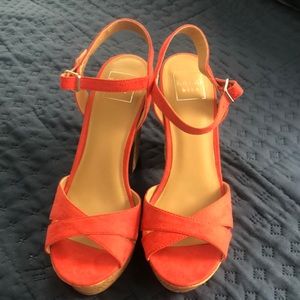 Size 8.5 brand new without tags/never worn. Coral colored sandals.